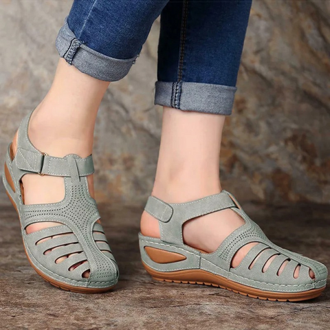 Side view of Astrid stylish women's sandals, showcasing Roman sandal design.
