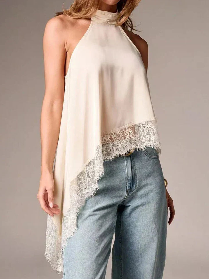 Elegant women's sleeveless halter top featuring an asymmetric design & delicate lace trim, ideal for modern fashion.