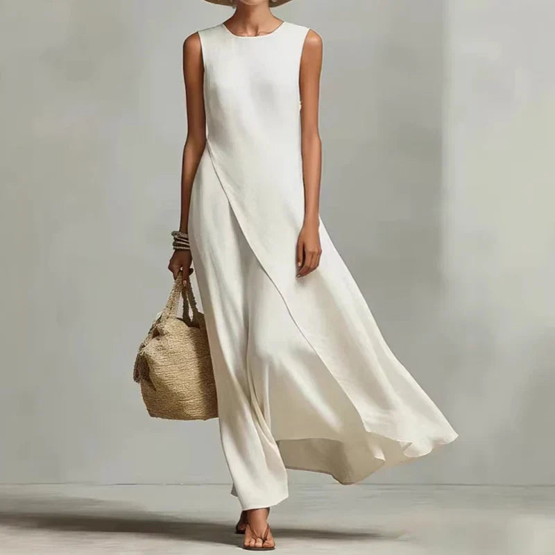 Relaxed fit women's asymmetrical maxi dress, sleeveless, chic for summer parties.