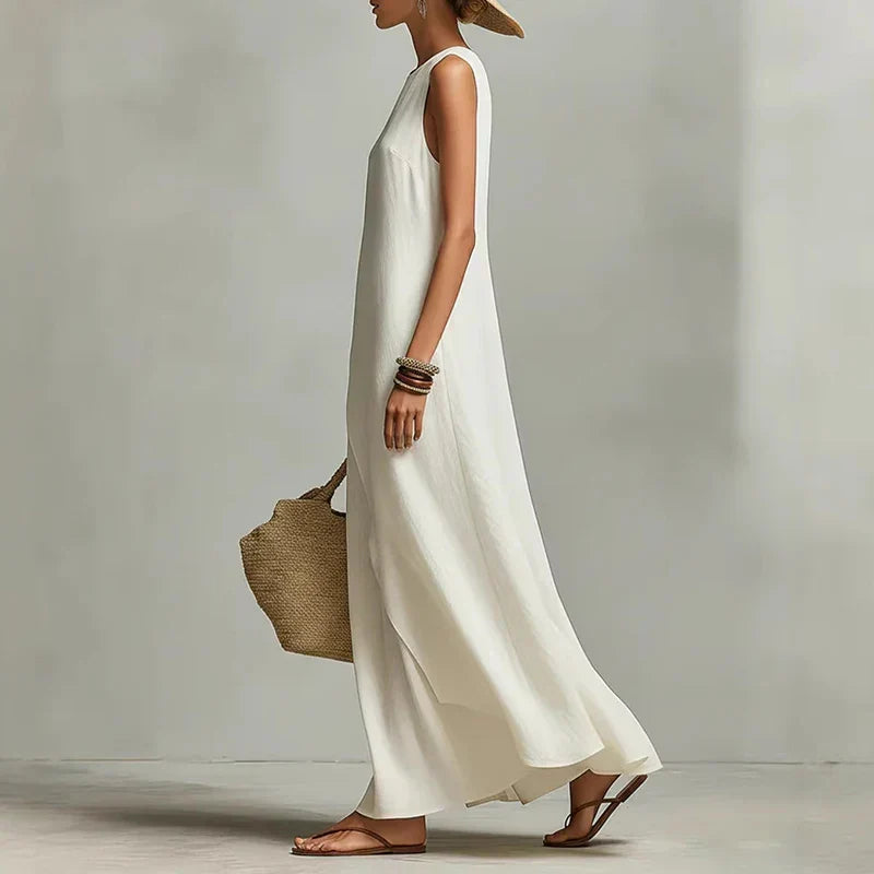 Stylish women's asymmetrical maxi dress, sleeveless, flowy & comfortable for vacation or party.