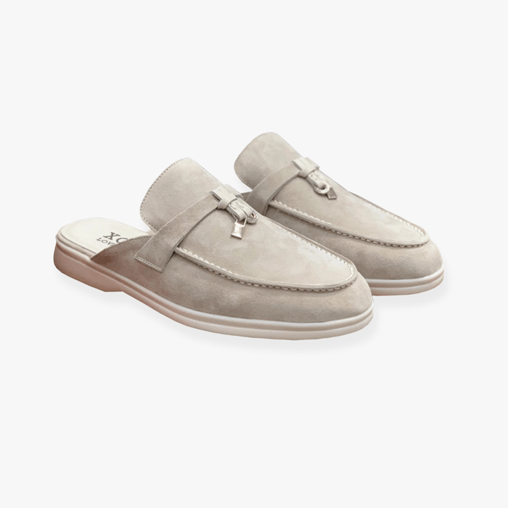 Stylish women's slip-on backless loafers, versatile flats perfect for smart casual outfits.