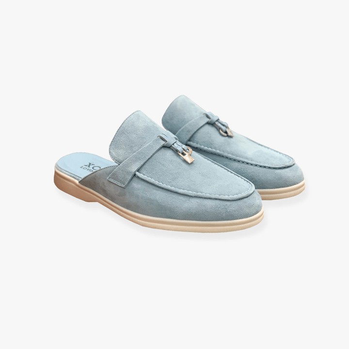 Chic women's backless loafers, comfortable slip-on flats and mules for a smart casual look.