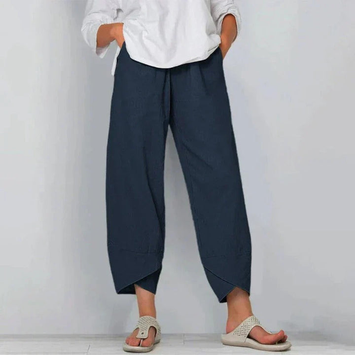 Effortless women's wide leg balloon pants with an elegant tulip hem, ideal for smart casual workwear.