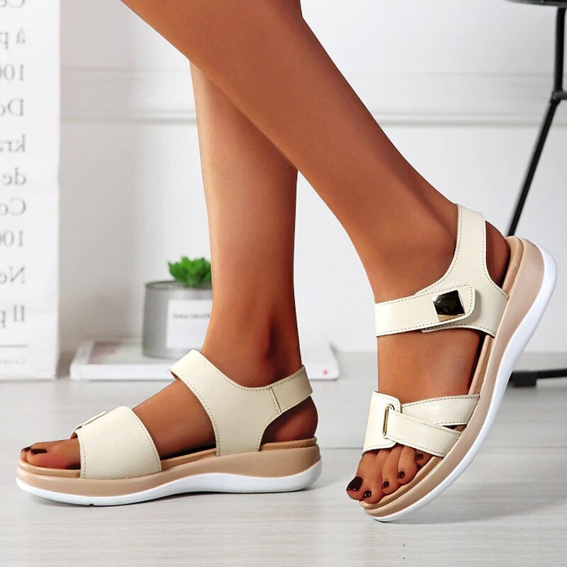 Black women's orthopedic sandals with adjustable straps & cushioned footbed, offering excellent foot support for casual summer walks.