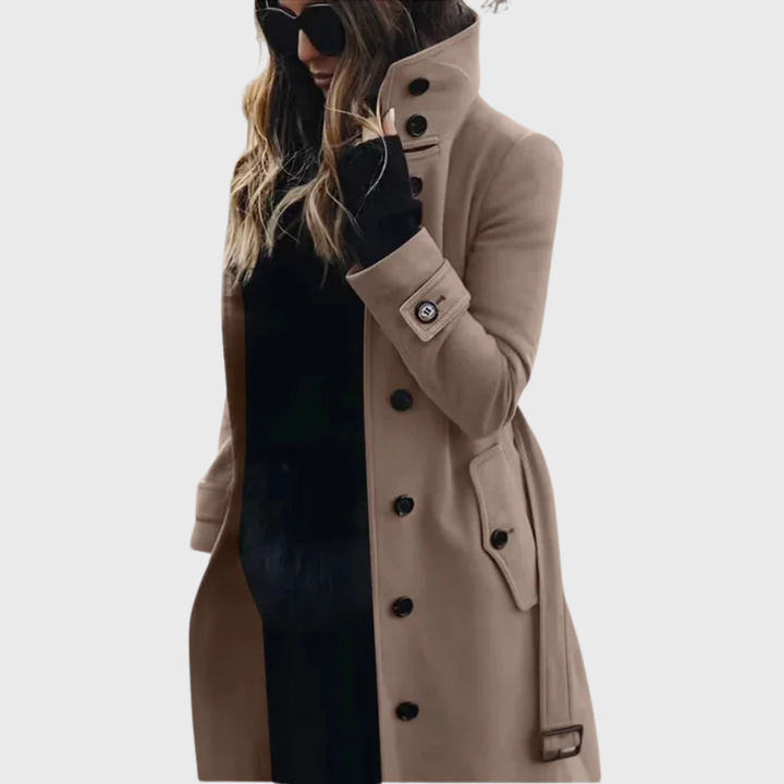 Women's beige button front trench coat with high stand collar. Elegant longline fall/winter outerwear.