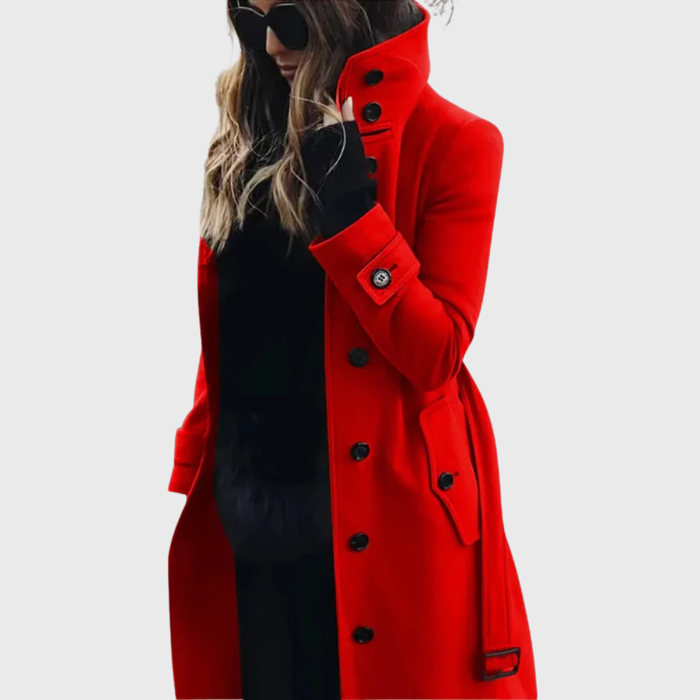 Elegant women's longline trench coat. Features button front closure and a chic high stand collar for winter.