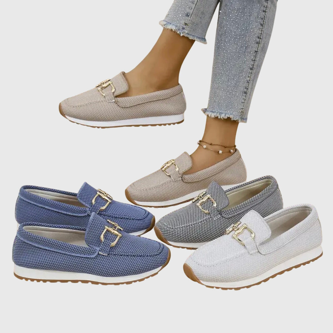 White orthopedic women's loafers, stylish comfort footwear with arch & foot support for casual walking.