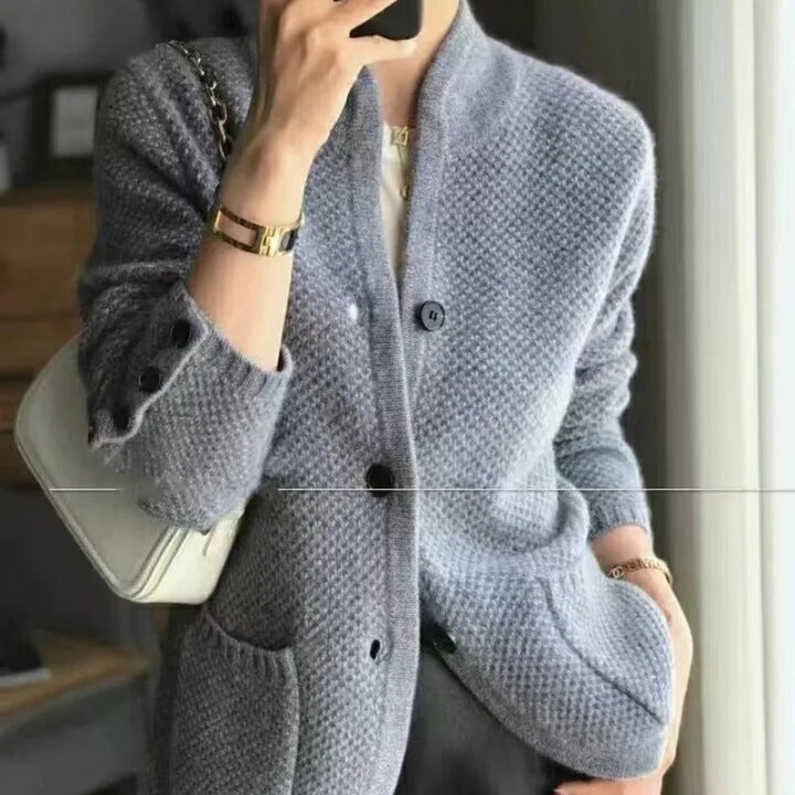 Brown women's textured knit button-up cardigan, relaxed fit and collarless. Ideal casual outerwear for layering.