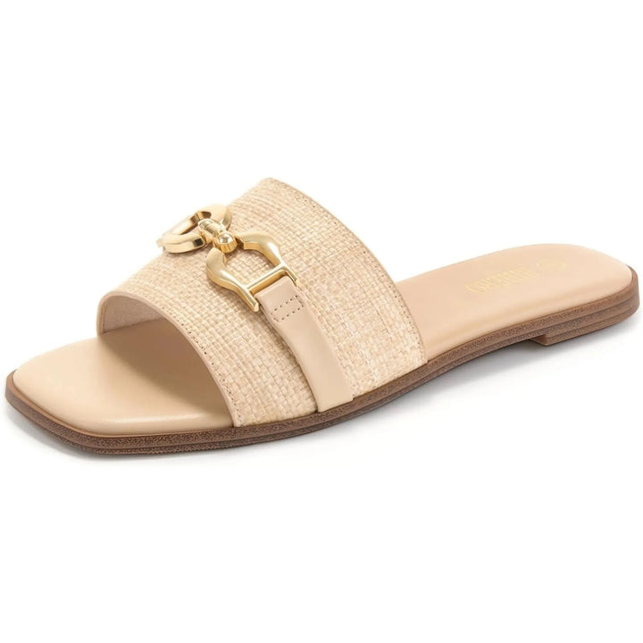 Women's beige woven slide sandals with decorative buckle accent. Ideal for summer casual wear.