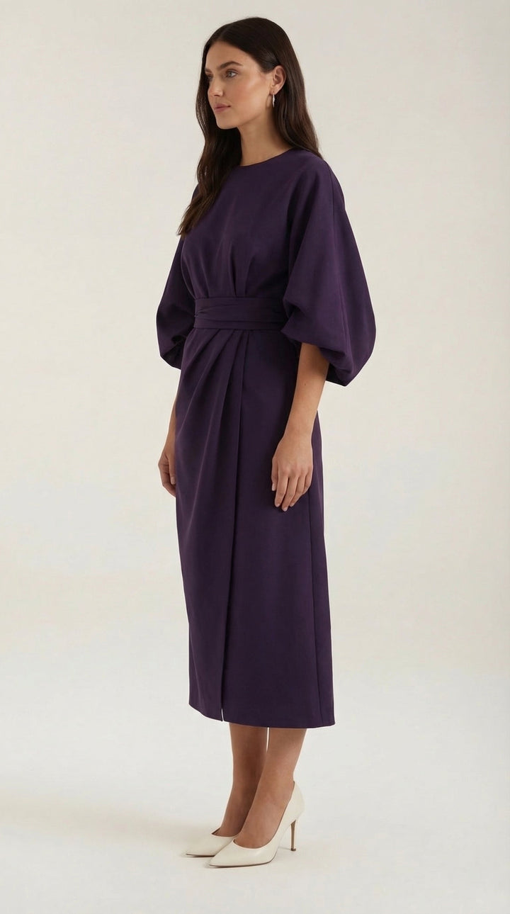 Chic midi dress featuring wide sleeves and a tie belt