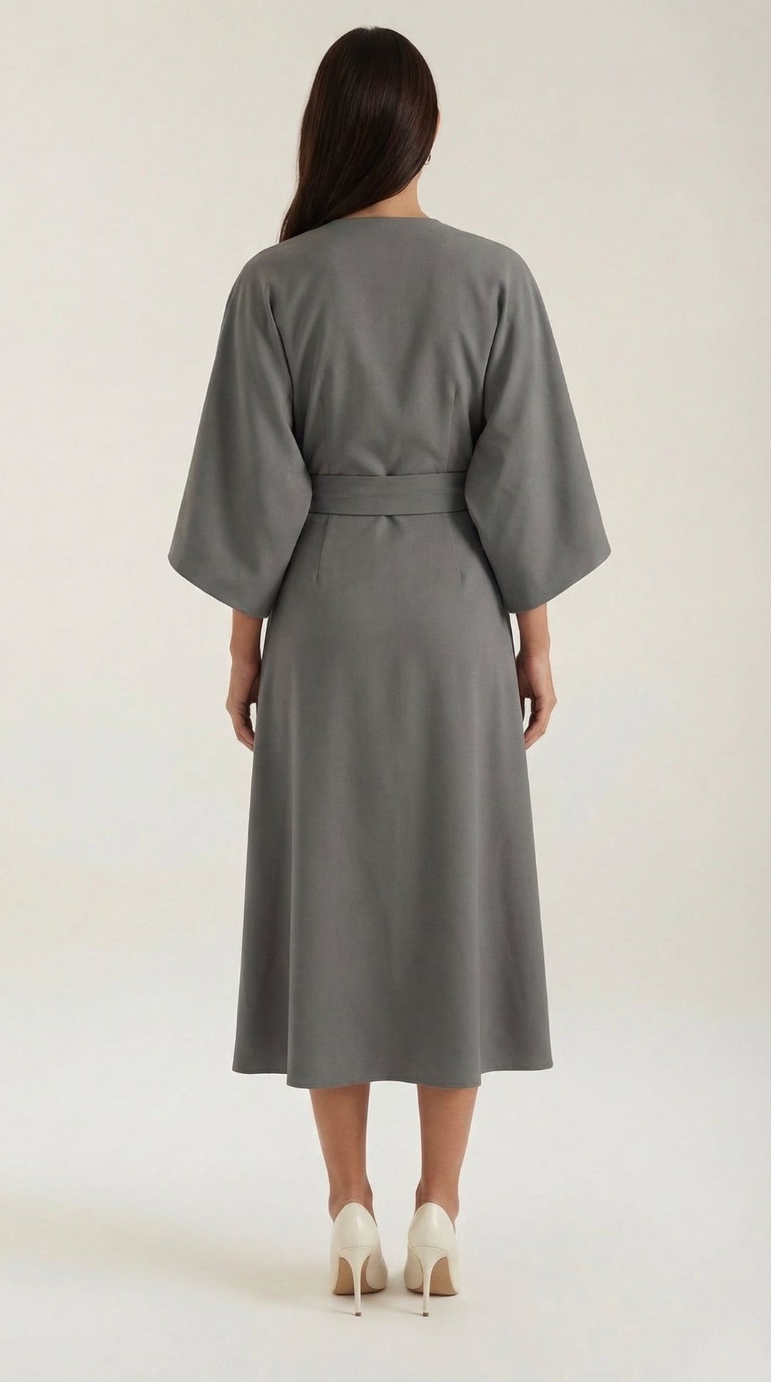 Versatile midi dress for day to night, featuring a belt