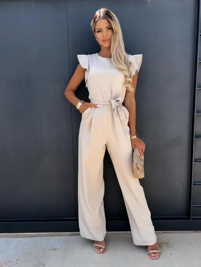 Versatile women's belted wide leg jumpsuit with butterfly sleeves, ideal for day to night wear.