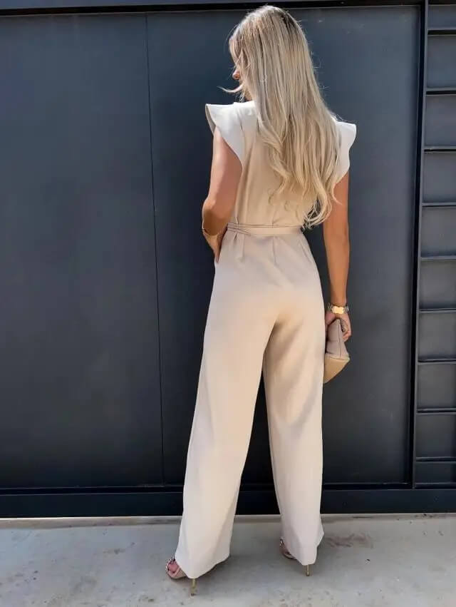 Chic women's wide leg jumpsuit featuring a stylish belt and flowy butterfly sleeves.