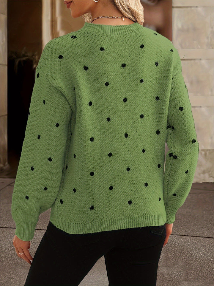 Fashionable women's polka dot knit sweater showcasing vibrant autumn color palette.