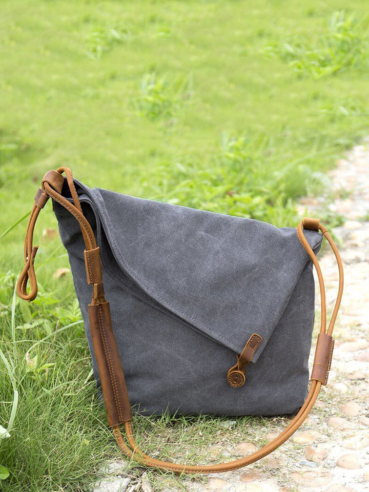Everyday essential: Women's brown asymmetrical slouchy shoulder bag with an adjustable strap.