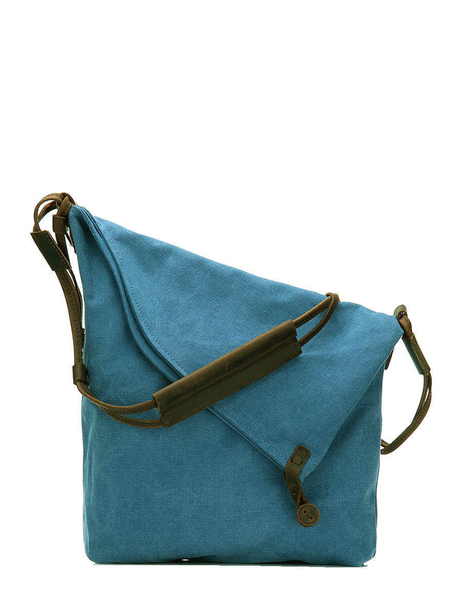 Women's fashion brown asymmetrical slouchy crossbody bag, ideal for casual and stylish outfits.