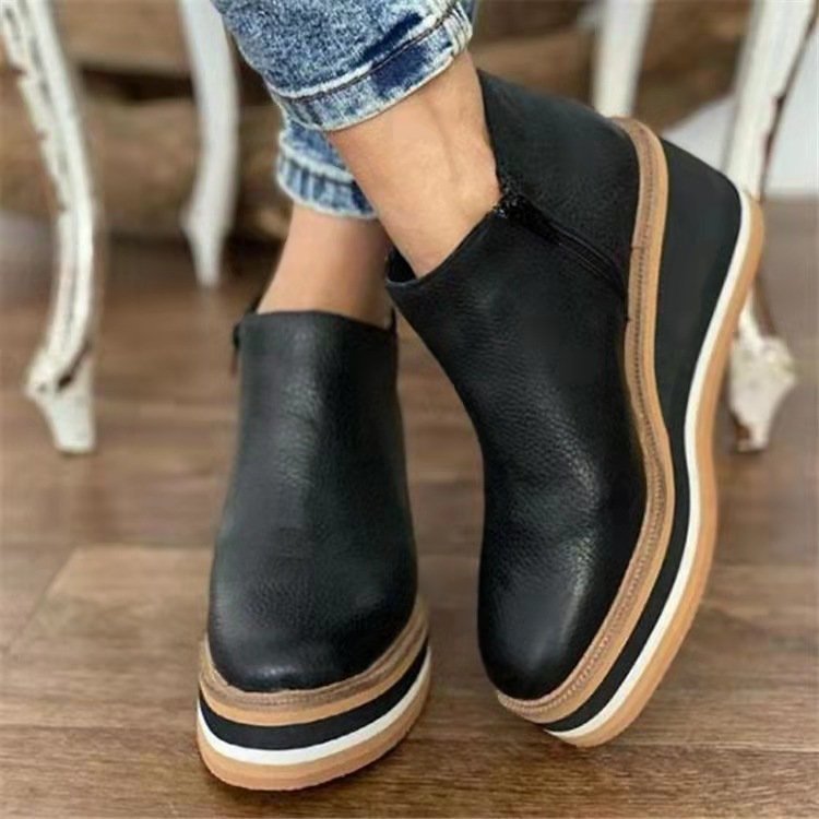Women's black chunky heel ankle boots with side zipper closure, perfect for autumn & winter style.