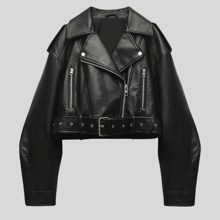 Close-up of women's tailored faux leather biker jacket, showcasing zipper and pocket details.