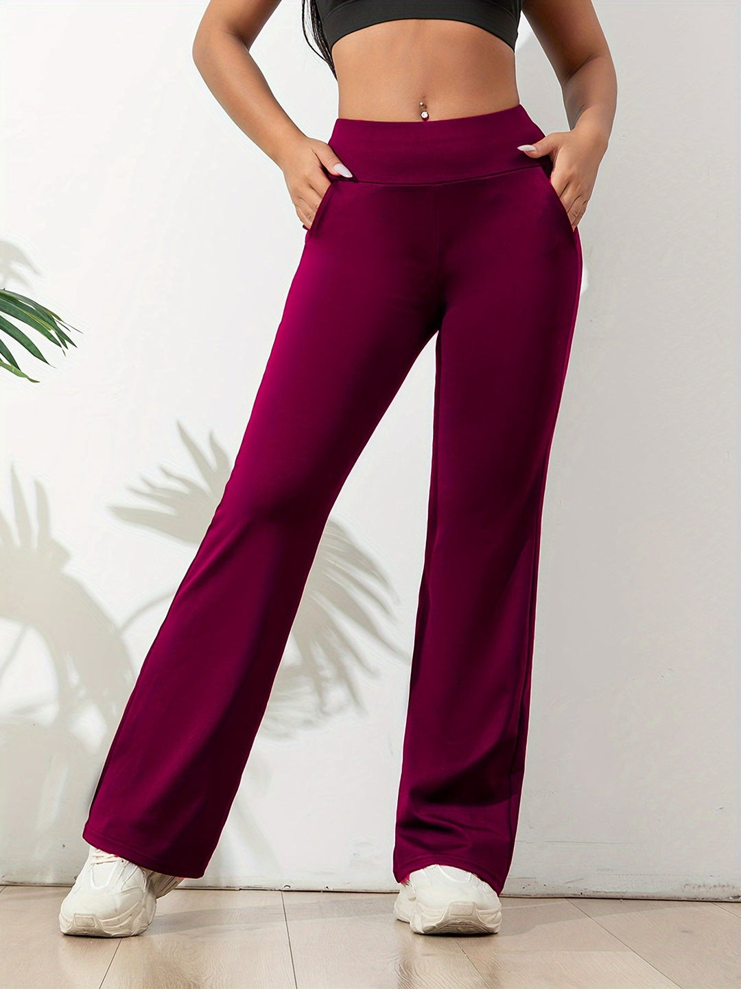 Women's comfortable flared yoga pants. Ideal activewear for versatile fitness, workout sessions, and leisure.