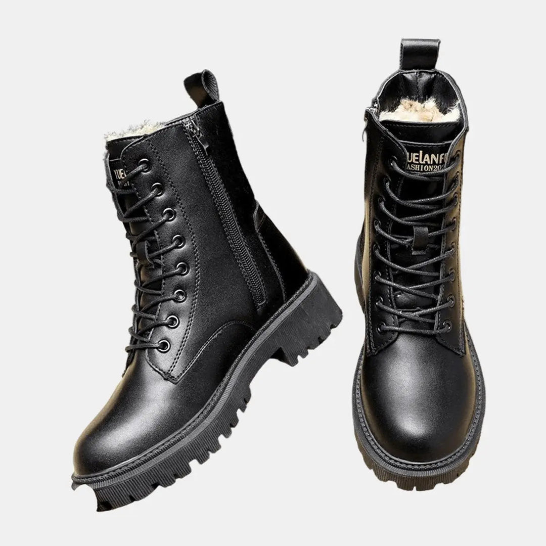 Stylish women's black lace-up combat ankle boots with a chunky sole & warm fur lining, ideal for cold weather.