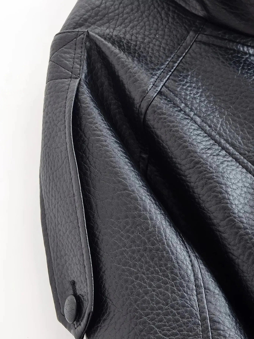 Women's black high neck leather jacket, a versatile and stylish outerwear piece for layering.