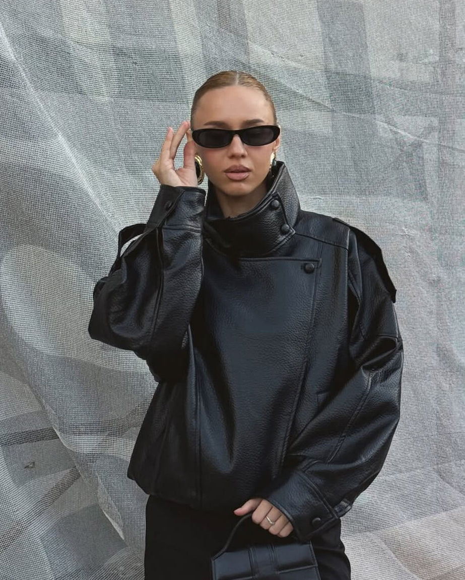 Sleek women's high neck leather jacket with full zip, perfect for modern and stylish layering.
