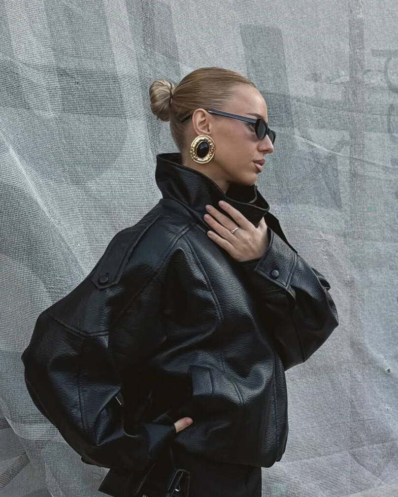 Versatile women's black high neck leather jacket, ideal for chic everyday fashion & outerwear.