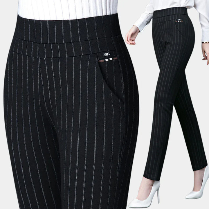 Women's black high-waisted stretch trousers, comfortable for all-season wear.