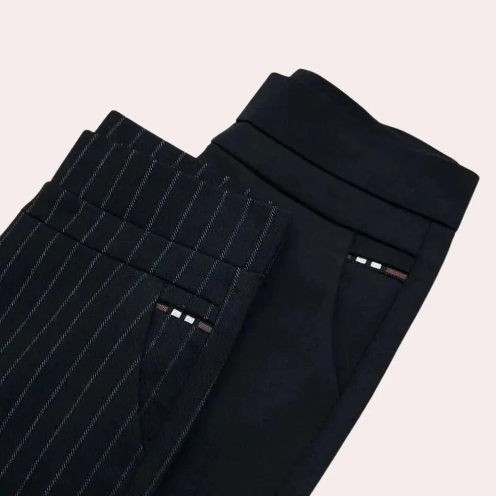 Versatile women's stretch pants in black, featuring a high waist and elastic band.