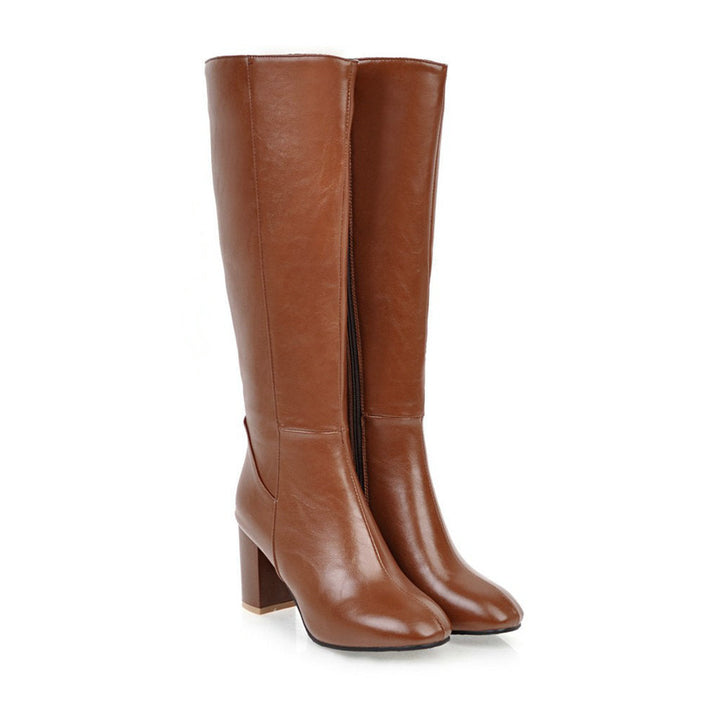 Women's black knee-high zip boots with stylish block heel.