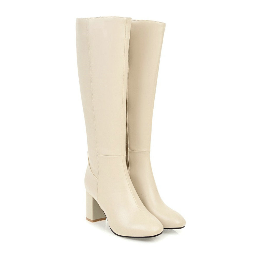 Elegant tall fashion boots for women, featuring a comfortable block heel and side zip.
