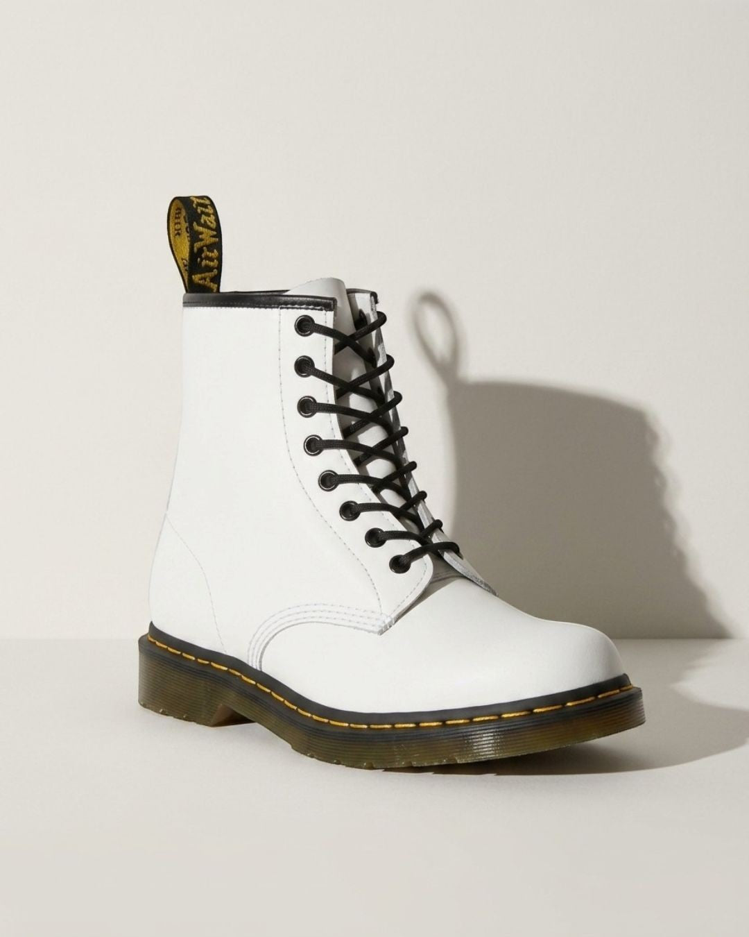 Women's black motorcycle combat boots, lace-up ankle design with a sturdy chunky sole for edgy style.
