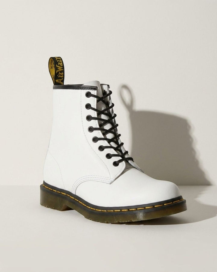 Women's black motorcycle combat boots, lace-up ankle design with a sturdy chunky sole for edgy style.