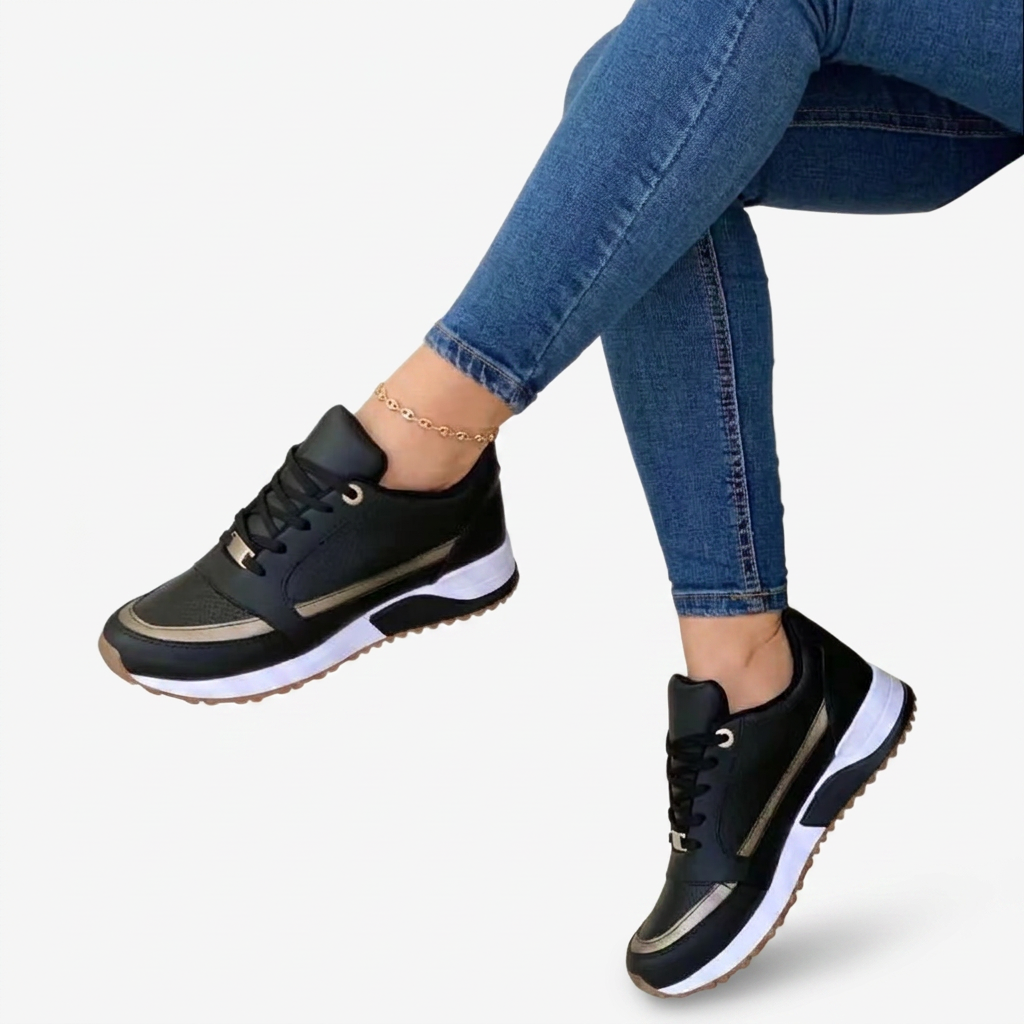 Stylish black lace-up platform sneakers for women, designed for everyday wear with trendy metallic accents.