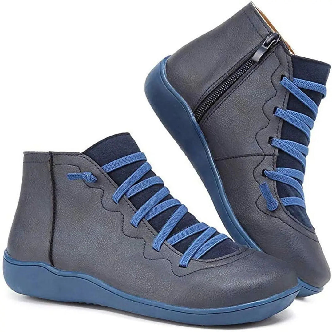 Durable women's lace-up ankle boots with side zip & flat heel for everyday comfort and casual style.