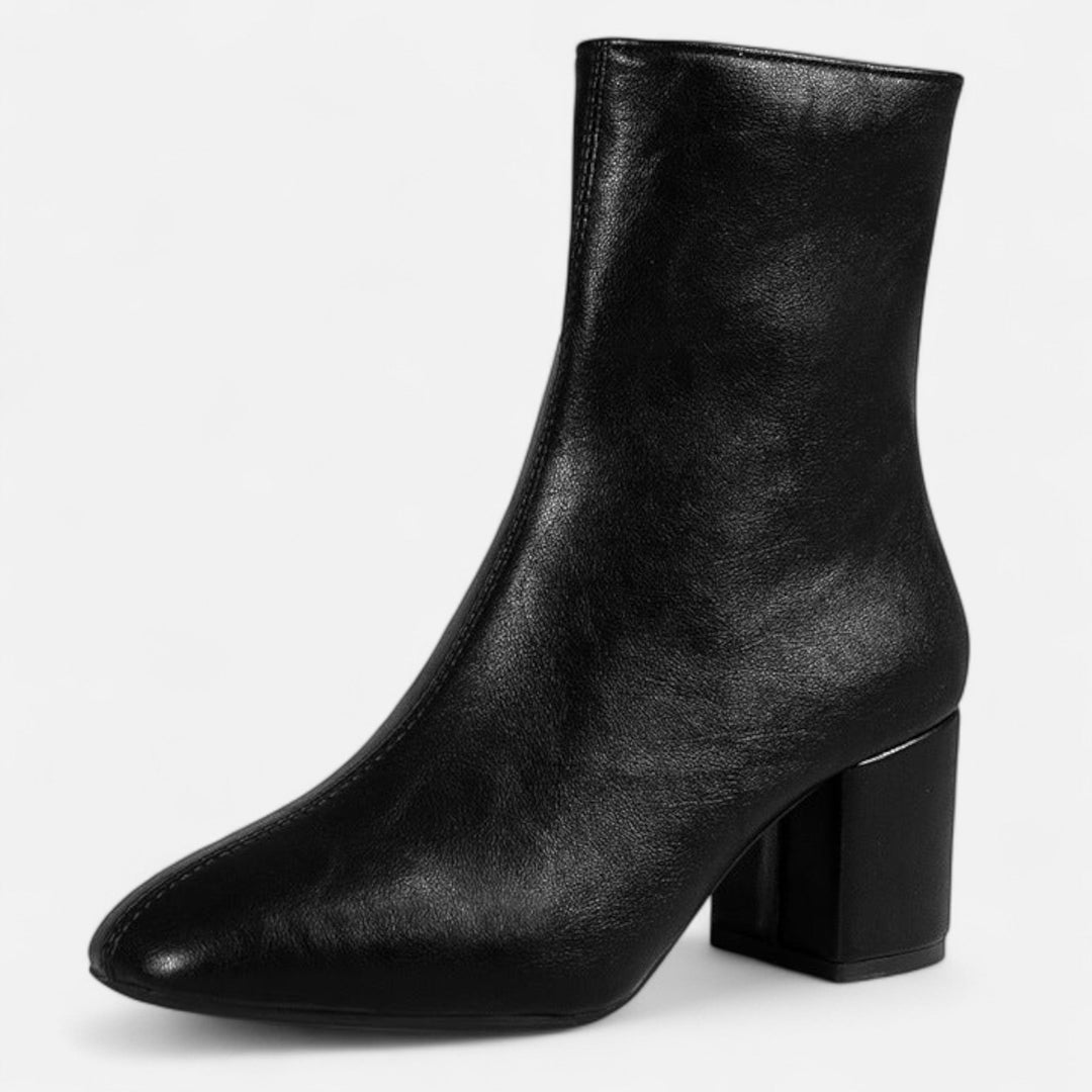 Close-up of chic women's ankle boots crafted from premium leather