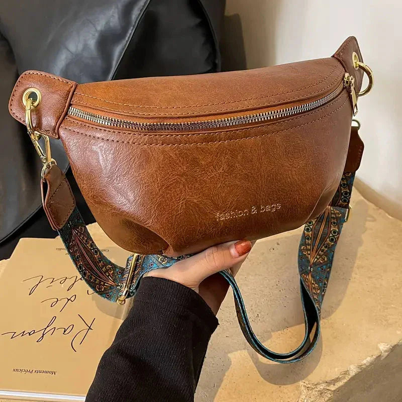 Women's black leather belt bag, perfect for waist, hip, or crossbody wear. Adjustable strap for versatile styling.