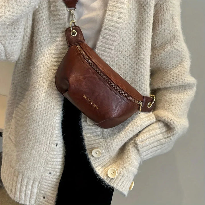 Versatile women's leather belt bag. Wear it as a waist bag, hip bag, or crossbody. Fashionable everyday accessory.