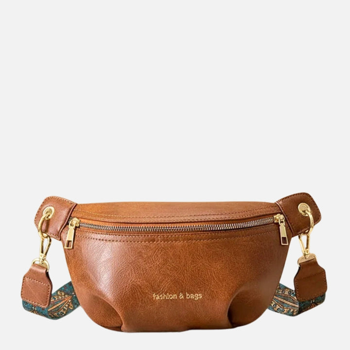 Elegant black leather belt bag for women with an adjustable strap, ideal as a hip or crossbody bag for essentials.