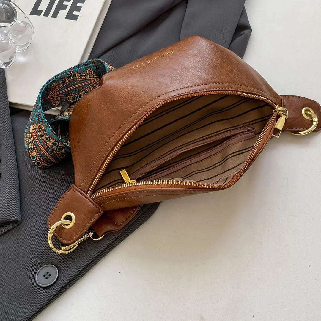 Fashionable women's leather belt bag, a trendy accessory for everyday carry, doubles as a crossbody or waist bag.