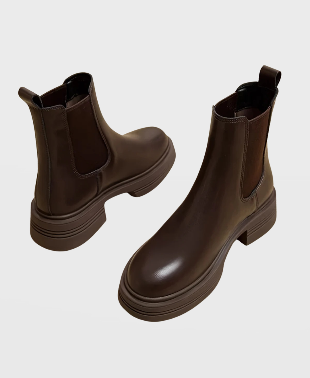 Comfortable women's Chelsea ankle boots with sturdy block heel. Versatile slip-on design, perfect for fall and winter fashion.