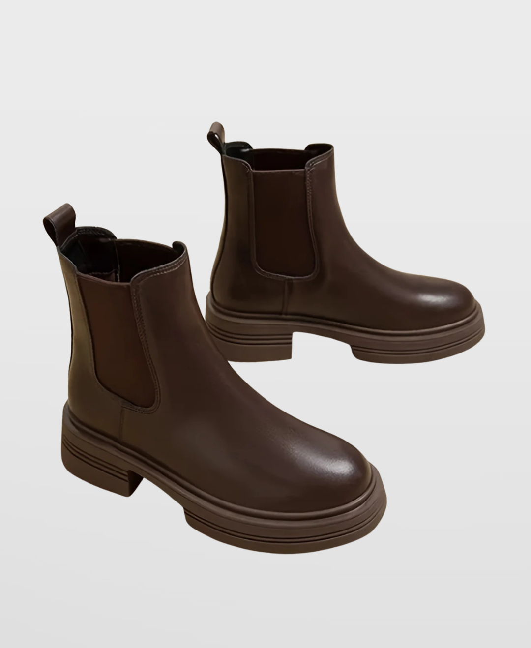 Classic women's Chelsea ankle boots, sleek black, with a comfortable block heel, elastic gussets, and round toe. Fashionable & practical.