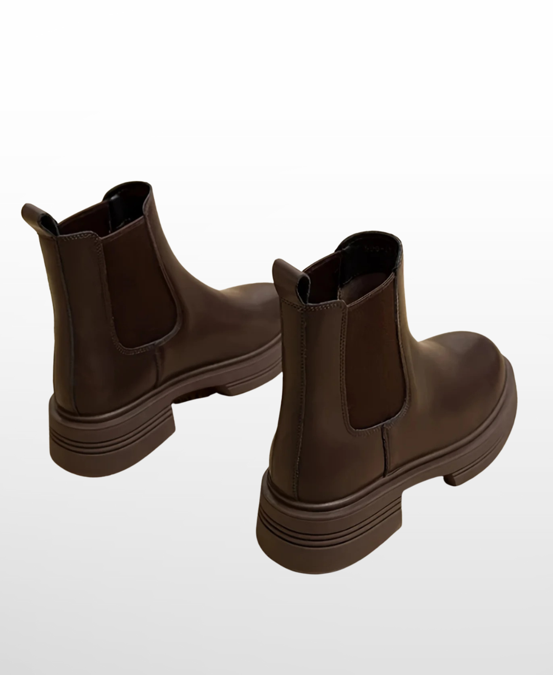 Slip-on women's Chelsea ankle boots with a comfortable block heel, perfect for fall and winter. Stylish and easy-to-wear everyday boots.
