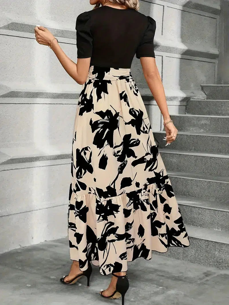 Dark green women's flowing floral maxi dress, a chic botanical print summer sundress for elegant occasions.