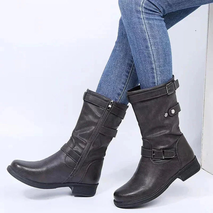 Comfortable black women's mid-calf orthopedic biker boots, designed for support with a practical side zipper.