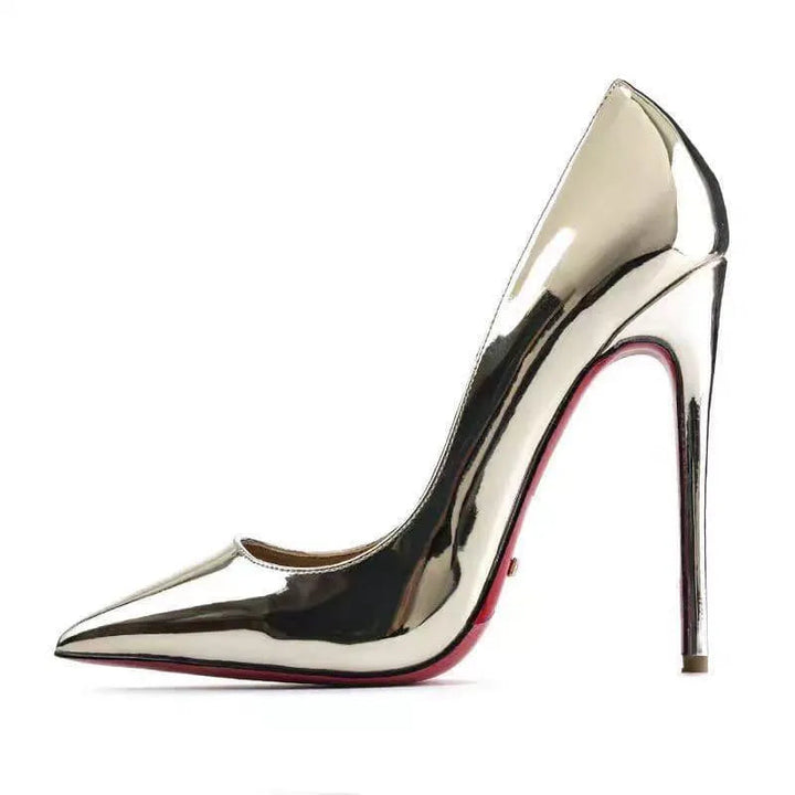 Close-up of elegant women's patent pointed toe stiletto heels, showcasing glossy finish.