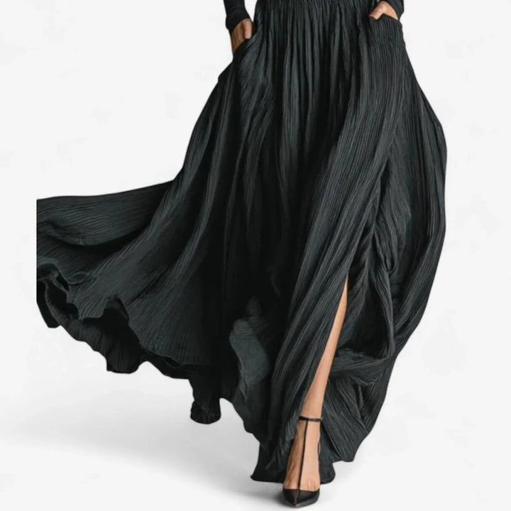 Sophisticated women's black turtleneck maxi dress, long sleeves & elegant pleats for formal or evening occasions.