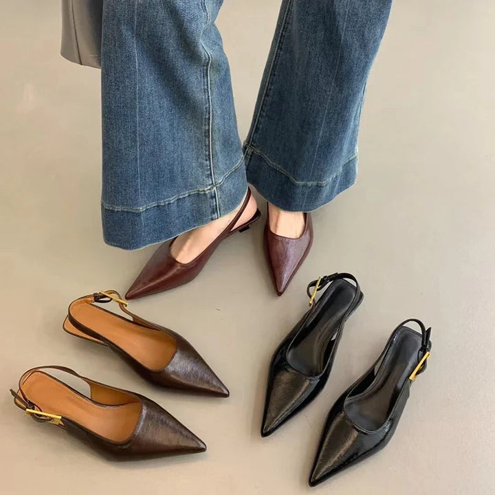 Women's black pointed toe kitten heel mules, perfect for dressy occasions & work wear.