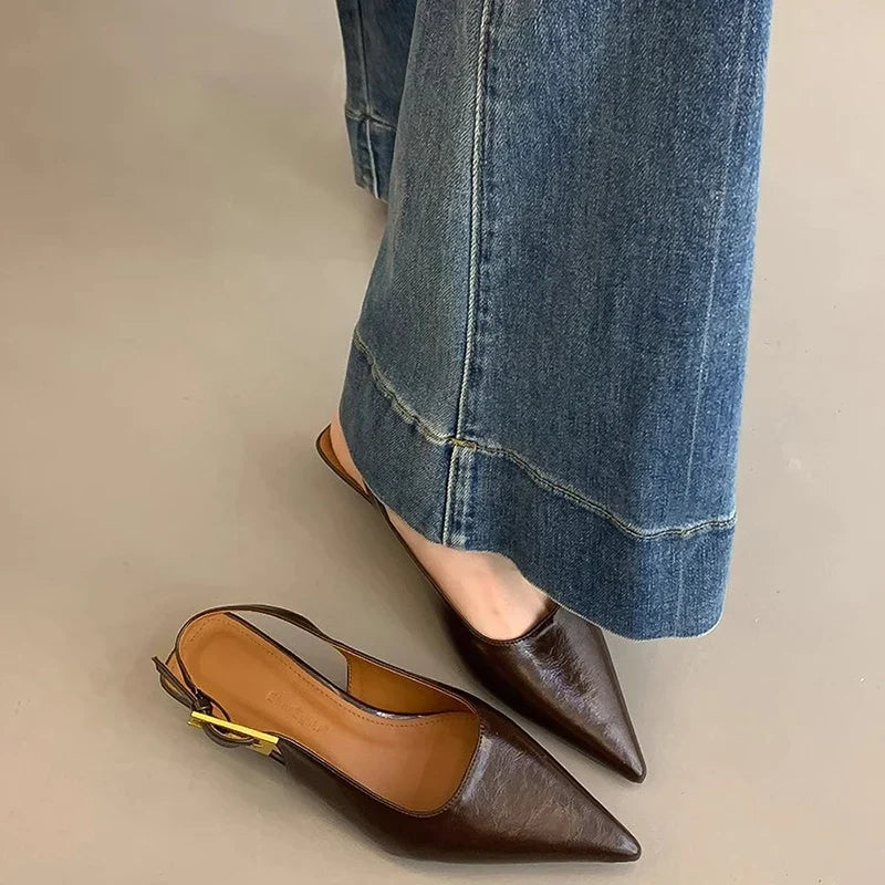 Stylish women's black leather pointed toe kitten heel mules, comfortable dress shoes for work.