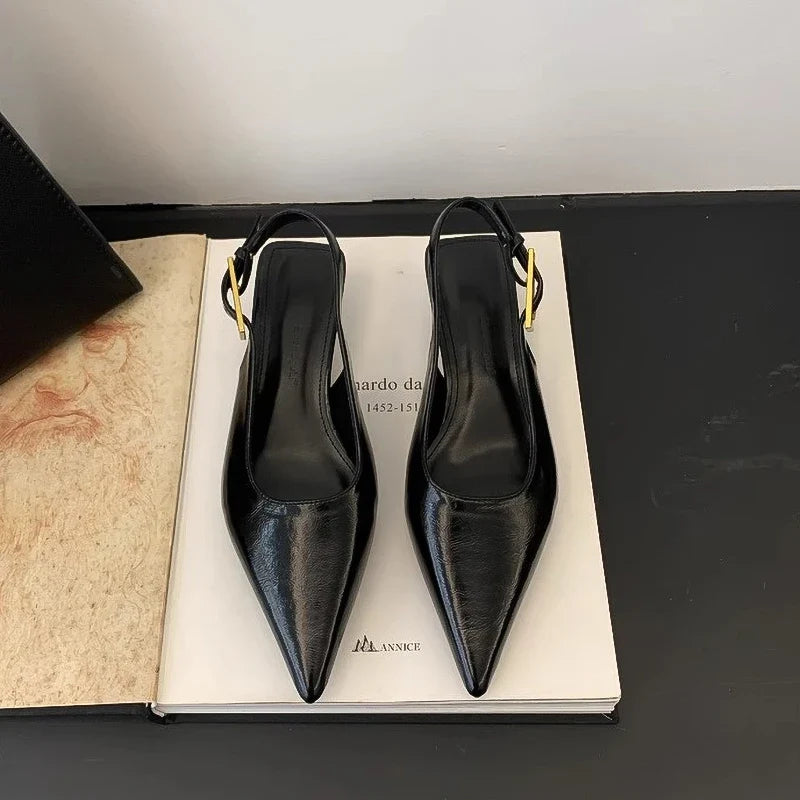 Comfortable women's pointed toe kitten heel mules in a stylish slip-on design, perfect for daily wear.